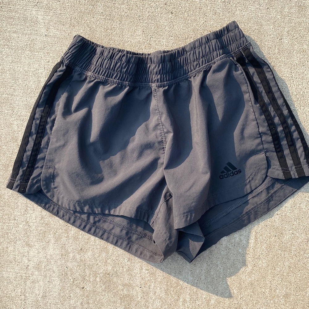 grey and black adidas athletic shorts